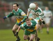3 December 2006; Rhode's Brian Darby and Barry Malone, left, in action against Jason Philips, Moorefield, AIB Leinster Senior Club Football Championship Final, Moorefield v Rhode, O'Moore Park, Portlaoise, Co. Laois. Picture credit: Damien Eagers / SPORTSFILE