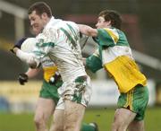 3 December 2006; Ronan Sweeny, Moorefield, in action against Mark Cassidy, Rhode. AIB Leinster Senior Club Football Championship Final, Moorefield v Rhode, O'Moore Park, Portlaoise, Co. Laois. Picture credit: Damien Eagers / SPORTSFILE