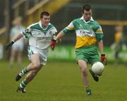 3 December 2006; Eoghan Byrne, Rhode, in action against Frank Hanniffy, Moorefield. AIB Leinster Senior Club Football Championship Final, Moorefield v Rhode, O'Moore Park, Portlaoise, Co. Laois. Picture credit: Damien Eagers / SPORTSFILE