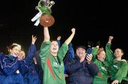 2 December 2006; Mayo League captain Michelle Ruane lifts the cup as she is applauded by her team-mates and David Blood, President of the FAI. Women's FAI Senior Cup Final, UCD v Mayo League, Richmond Park, Dublin. Picture credit: Damien Eagers / SPORTSFILE