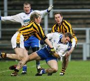 3 December 2006; Kevin M McGuckin, Ballinderry, in action against Johnny Hanratty and John McEntee, Crossmaglen Rangers. AIB Ulster Club Senior Football Championship Final, Ballinderry v Crossmaglen Rangers, Casement Park, Belfast, Co. Antrim. Picture credit: Oliver McVeigh / SPORTSFILE