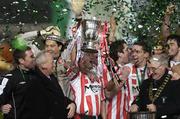 3 December 2006; Derry City captain Peter Hutton lifts the cup. FAI Carlsberg Senior Challenge Cup Final, Derry City v St Patrick's Athletic, Lansdowne Road, Dublin. Picture credit: Brian Lawless / SPORTSFILE