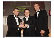 26 November 2006; Philip Hughes, centre, Dundalk, winner of the eircom League First Division, player of the year award, with Denis Irwin, former Republic of Ireland, and Tony McDonnell, right, Chairman of the PFAI. 27th PFAI Player Awards. Burlington Hotel, Dublin. Picture credit: David Maher / SPORTSFILE