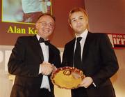 26 November 2006; Fran Gavin, left, Secretary PFAI presents Alan Kelly, with the Referee of the year award at the 27th PFAI Player Awards. Burlington Hotel, Dublin. Picture credit: David Maher / SPORTSFILE