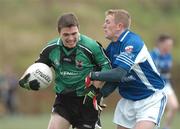 5 December 2006; Stephen Kelly, Garda College, in action against Gavin Donaghy, Queen's University. Higher Education Division 1 Football League Final, Garda College v Queen's University, Ballymun Kickhams, Dublin. Picture credit: Damien Eagers / SPORTSFILE