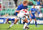 30 August 2014; Tom Denton, Leinster, is tackled by Craig Gilroy, Ulster. Pre-Season Friendly, Leinster v Ulster. Tallaght Stadium, Tallaght, Co. Dublin. Picture credit: Ramsey Cardy / SPORTSFILE