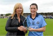 30 August 2014;  Lyndsey Davey, Dublin, is presented with the Player of the Match by Helen O'Rourke, Chief Executive, Ladies Gaelic Football Association. TG4 All-Ireland Ladies Football Senior Championship, Semi-Final, Dublin v Galway, Cusack Park, Mullingar, Co. Westmeath. Picture credit: Oliver McVeigh / SPORTSFILE