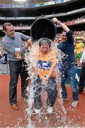 31 August 2014; RTE's Marty Morrissey partakes in the Ice Bucket Challenge with former Dublin player Ciaran Whelan, left, and Donegal's Mark McHugh during half time. GAA Football All Ireland Senior Championship, Semi-Final, Dublin v Donegal, Croke Park, Dublin. Picture credit: David Maher / SPORTSFILE