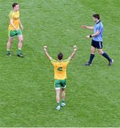 31 August 2014; Karl Lacey, Donegal, celebrates at the final whistle, as Bernard Brogan, Dublin, and Martin McElhiney, shake hands after the game. GAA Football All Ireland Senior Championship, Semi-Final, Dublin v Donegal, Croke Park, Dublin. Picture credit: Dáire Brennan / SPORTSFILE