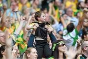 31 August 2014; A young Donegal supporter is held up high during the closing stages of the game. GAA Football All Ireland Senior Championship Semi-Final, Dublin v Donegal, Croke Park, Dublin. Picture credit: David Maher / SPORTSFILE