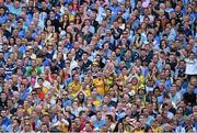 31 August 2014; Donegal supporters, sitting amongst Dublin supporters, cheer after a score by their side. GAA Football All Ireland Senior Championship Semi-Final, Dublin v Donegal, Croke Park, Dublin. Picture credit: Brendan Moran / SPORTSFILE