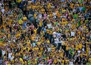 31 August 2014; Donegal supporters in Cuasack Stand celebrate their side's third goal. GAA Football All Ireland Senior Championship Semi-Final, Dublin v Donegal, Croke Park, Dublin. Picture credit: Dáire Brennan / SPORTSFILE