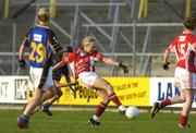 3 December 2006; Amy O'Shea, Inch Rovers, shoots to score her side's goal despite the tackle from Meave Redmond, Naomh Mearnog / St Sylvesters. Vhi Healthcare All-Ireland Ladies Intermediate Club Championship Final, Inch Rovers v Naomh Mearnog / St Sylvesters, Nolan Park, Kilkenny. Picture credit: Ray Lohan / SPORTSFILE