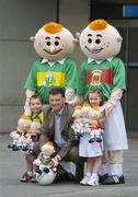 4 December 2006; Mayo manager John O'Mahony with 3 year old Aidan Hegarty and his sister Cara, aged 5, from Armagh, at the launch of 'RUA', the new children's GAA mascot created by Sports Merchandising Ireland Ltd. RUA is a soft toy which comes decked out in your favourite county colours and is available now. Croke Park, Dublin. Picture credit: Pat Murphy / SPORTSFILE