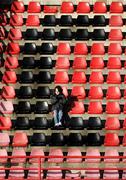 9 December 2006; Crusaders fan Paul Wilson waits for his dad to come with his cup of the tea. Carnegie Premier League, Crusaders v Glentoran, Seaview, Belfast. Picture credit: Russell Pritchard / SPORTSFILE
