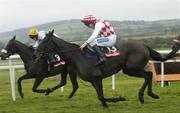 10 December 2006; The eventual winner Shanghide, with Conor O'Dwyer up, 13, races alongside Failte Arais, Paul Carberry up, who finished second, on their way to winning The Benson Burger Express Maiden Hurdle. Punchestown Racecourse, Co. Kildare. Picture credit: Brian Lawless / SPORTSFILE