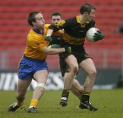10 December 2006; Eanna Kavanagh, Dr Crokes, in action against Liam Lawlor, The Nire. AIB Munster Senior Club Football Championship Final, Dr Crokes v The Nire, Pairc Ui Chaoimh, Cork. Picture credit: David Maher / SPORTSFILE