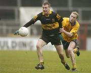 10 December 2006; James Fleming, Dr Crokes, in action against Maurice O'Gorman, The Nire. AIB Munster Senior Club Football Championship Final, Dr Crokes v The Nire, Pairc Ui Chaoimh, Cork. Picture credit: David Maher / SPORTSFILE