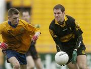10 December 2006; Eoin Brosnan, Dr Crokes, in action against Diarmuid Wall, The Nire. AIB Munster Senior Club Football Championship Final, Dr Crokes v The Nire, Pairc Ui Chaoimh, Cork. Picture credit: David Maher / SPORTSFILE