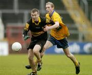 10 December 2006; James Fleming, Dr Crokes, in action against Maurice O'Gorman, The Nire. AIB Munster Senior Club Football Championship Final, Dr Crokes v The Nire, Pairc Ui Chaoimh, Cork. Picture credit: David Maher / SPORTSFILE