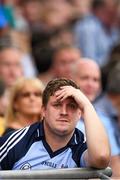 31 August 2014; A dejected Dublin supporter during the closing stages of the game. GAA Football All Ireland Senior Championship Semi-Final, Dublin v Donegal, Croke Park, Dublin. Picture credit: Stephen McCarthy / SPORTSFILE