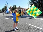 31 August 2014; Dual-supporter Katy Sharkey, aged 4, from Cloghran, Co. Dublin, but with a Donegal mother, on her way to the game. GAA Football All Ireland Senior Championship Semi-Final, Dublin v Donegal, Croke Park, Dublin. Picture credit: Dáire Brennan / SPORTSFILE