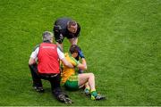 31 August 2014; Referee Joe McQuillan tries to lift Paddy McGrath, Donegal, during the final moments of the game. McGrath was subsequently black carded for time wasting. GAA Football All Ireland Senior Championship, Semi-Final, Dublin v Donegal, Croke Park, Dublin. Picture credit: Dáire Brennan / SPORTSFILE