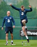 1 September 2014; Republic of Ireland's James McClean is put through his paces by fitness coach Dan Horan during squad training ahead of their side's International friendly match against Oman on Wednesday. Republic of Ireland Squad Training, Gannon Park, Malahide, Co. Dublin. Picture credit: Brendan Moran / SPORTSFILE