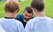 1 September 2014; Republic of Ireland assistant manager Roy Keane signs autographs after squad training ahead of their side's International friendly match against Oman on Wednesday. Republic of Ireland Squad Training, Gannon Park, Malahide, Co. Dublin. Picture credit: Brendan Moran / SPORTSFILE