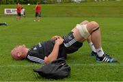 1 September 2014; Munster's Paul O'Connell stretches before squad training ahead of their Guinness PRO12 round 1 match against Edinburgh on Friday. Munster Rugby Squad Training, University of Limerick, Limerick. Picture credit: Diarmuid Greene / SPORTSFILE