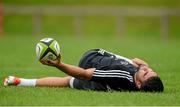 1 September 2014; Munster's Conor Murray stretches during squad training ahead of their Guinness PRO12 round 1 match against Edinburgh on Friday. Munster Rugby Squad Training, University of Limerick, Limerick. Picture credit: Diarmuid Greene / SPORTSFILE