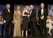 18 November 2006; Mary O'Connor, Cork, receives her All-Star award from An Taoiseach Bertie Ahern, TD, in the company of, from left, Pol O Gallchoir, Ceannsai, TG4, Geraldine Giles, President, Cumann Peil Gael na mBan, and Tony Towell, Managing Director O'Neills, at the 2006 TG4 / O'Neills Ladies Gaelic Football All-Star Awards. Citywest Hotel, Dublin. Picture credit: Brendan Moran / SPORTSFILE