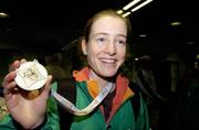 11 December 2006; Fionnuala Britton, Wicklow, won a silver medal in the Under-23 women’s race at the SPAR European Cross-country Championships at San Giorgio su Legnano, Milan, on her arrival at Dublin airport with the Irish team. Dublin Airport, Dublin. Picture credit: David Maher / SPORTSFILE
