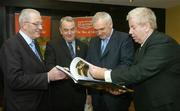 11 December 2006; An Taoiseach Bertie Ahern T.D. with, from left, Seamus Carroll, founder of Carroll Cuisine, Nickey Brennan, President of the GAA and Ray McManus of Sportsfile, at the book launch of A Season of Sundays 2006. This is the 10th Edition of A Season of Sundays, a collection of images from the 2006 Gaelic Games year by Sportsfile photographers. Jurys Croke Park Hotel, Jones' Road, Dublin. Picture credit: Brendan Moran / SPORTSFILE