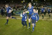 9 December 2006; Leinster captain Brian O'Driscoll leads his side out with the team mascots. Heineken Cup 2006-2007, Pool 2, Round 3, Leinster v Agen, Lansdowne Road, Dublin. Picture credit: Brendan Moran / SPORTSFILE