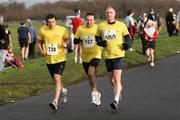 17 December 2006; Members of the Dublin Fire Brigade, from left, Rob Roe, Kingswood, Tallaght, David Greville, Blessington and Johnny McCormack, Kimmage, in action during the Aware 10K Christmas Fun Run. Papal Cross, Phoenix Park, Dublin. Picture credit: Tomas Greally / SPORTSFILE *** Local Caption ***