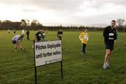 17 December 2006; Competitors warm up before the start of the Aware 10K Christmas Fun Run. Papal Cross, Phoenix Park, Dublin. Picture credit: Tomas Greally / SPORTSFILE *** Local Caption ***