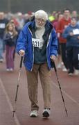 25 December 2006; The mountineer , eghty two-year-old, Joss Lynham 'competing' in one of the many Goal Miles taking place nationwide. Annual Goal Mile, Belfield, University College, Dublin. Picture credit: Ray McManus / SPORTSFILE