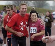25 December 2006; Eamonn Coghlan with  Karen Coghlan after 'competing' in one of the many Goal Miles taking place nationwide. Annual Goal Mile, Belfield, University College, Dublin. Picture credit: Ray McManus / SPORTSFILE