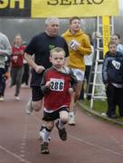 25 December 2006; Six-year-old Eoin Carey, from Clonskeagh, Dublin, 'competing' in one of the many Goal Miles taking place nationwide. Annual Goal Mile, Belfield, University College, Dublin. Picture credit: Ray McManus / SPORTSFILE