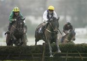 26 December 2006; Savitha, with John Cullen up, jumps the last alongside Havetoavit, with Richard Power up, left, during the Durkan New Homes Handicap Hurdle. Leopardstown Racecourse, Leopardstown, Dublin. Picture credit: Pat Murphy / SPORTSFILE
