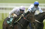 27 December 2006; Nickname, with Niall 'Slippers' Madden up, left, races ahead of second place Central House, Roger Loughran up, on their way to winning the Paddy Power Dial-A-Bet Steeplechase. Leopardstown Racecourse, Leopardstown, Dublin. Picture credit: Brian Lawless / SPORTSFILE