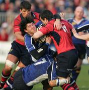 27 December 2006; Ian Dowling, Munster, is tackled by Shane Horgan and Keith Gleeson, Leinster. Magners League, Munster v Leinster, Thomond Park, Limerick. Picture credit: Kieran Clancy / SPORTSFILE