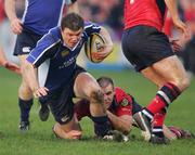 27 December 2006; Brian O'Driscoll, Leinster, is tackled by Barry Murphy, Munster. Magners League, Munster v Leinster, Thomond Park, Limerick. Picture credit: Kieran Clancy / SPORTSFILE