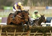 29 December 2006; Brave Inca, with Ruby Walsh up, on their way to winning the Bewleys bewleyshotel.com December Festival Hurdle after jumping the last from second place Iktitaf, partially hidden, with Paul Carberry up, and fourth place Silent Oscar, right, with Robbie Power up. Leopardstown Racecourse, Leopardstown, Dublin. Picture credit: Matt Browne / SPORTSFILE