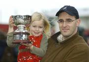 29 December 2006; Four year old Cara O'Tierney with her dad Fionan, a member of the winning syndicate, who won in the bewleyshotel.com December Festival Hurdle with Brave Inca. Leopardstown Racecourse, Leopardstown, Dublin. Picture credit: Matt Browne / SPORTSFILE