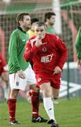 30 December 2006; Portadown's Gary McCutcheon runs to celebrate his equalising goal as Glentoran's Chris Morgan stands in the background. Carnegie Premier League, Glentoran v Portadown, The Oval, Belfast, Co. Antrim. Picture credit: Russell Pritchard / SPORTSFILE