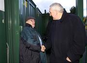 31 December 2006; An Taoiseach Bertie Ahern T.D, shakes hands with John O'Brien, who has worked on the entrance gate for the last twenty eight years, before the last game to be played at Lansdowne Road. Magners League, Leinster v Ulster, Lansdowne Road, Dublin. Picture credit: David Maher / SPORTSFILE