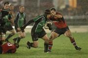 31 December 2006; Connacht's Ray Ofisa in action against Munster's Barry Murphy and David Wallace. Magners League, Connacht v Munster, Sportsground, Co. Galway. Picture credit: Ray Ryan / SPORTSFILE