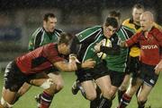 31 December 2006; Connacht's Keith Matthews in action against Munster's Donacha O Callaghan and Peter Stringer. Magners League, Connacht v Munster, Sportsground, Co. Galway. Picture credit: Ray Ryan / SPORTSFILE